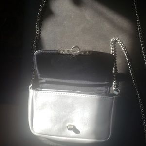 Silver clutch with strap